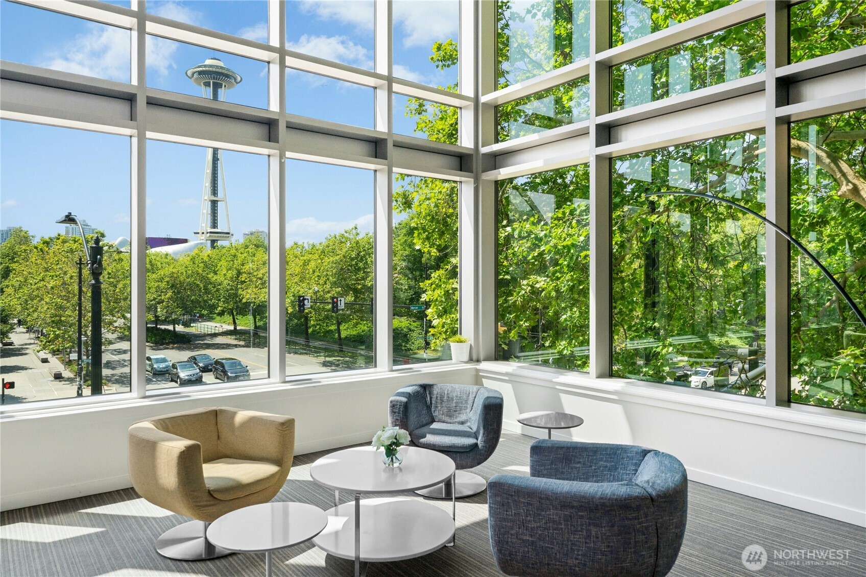 501 Roy Street, Unit F239 Seattle, WA 98109 - Photo 23 of 27 a living room with furniture and a window