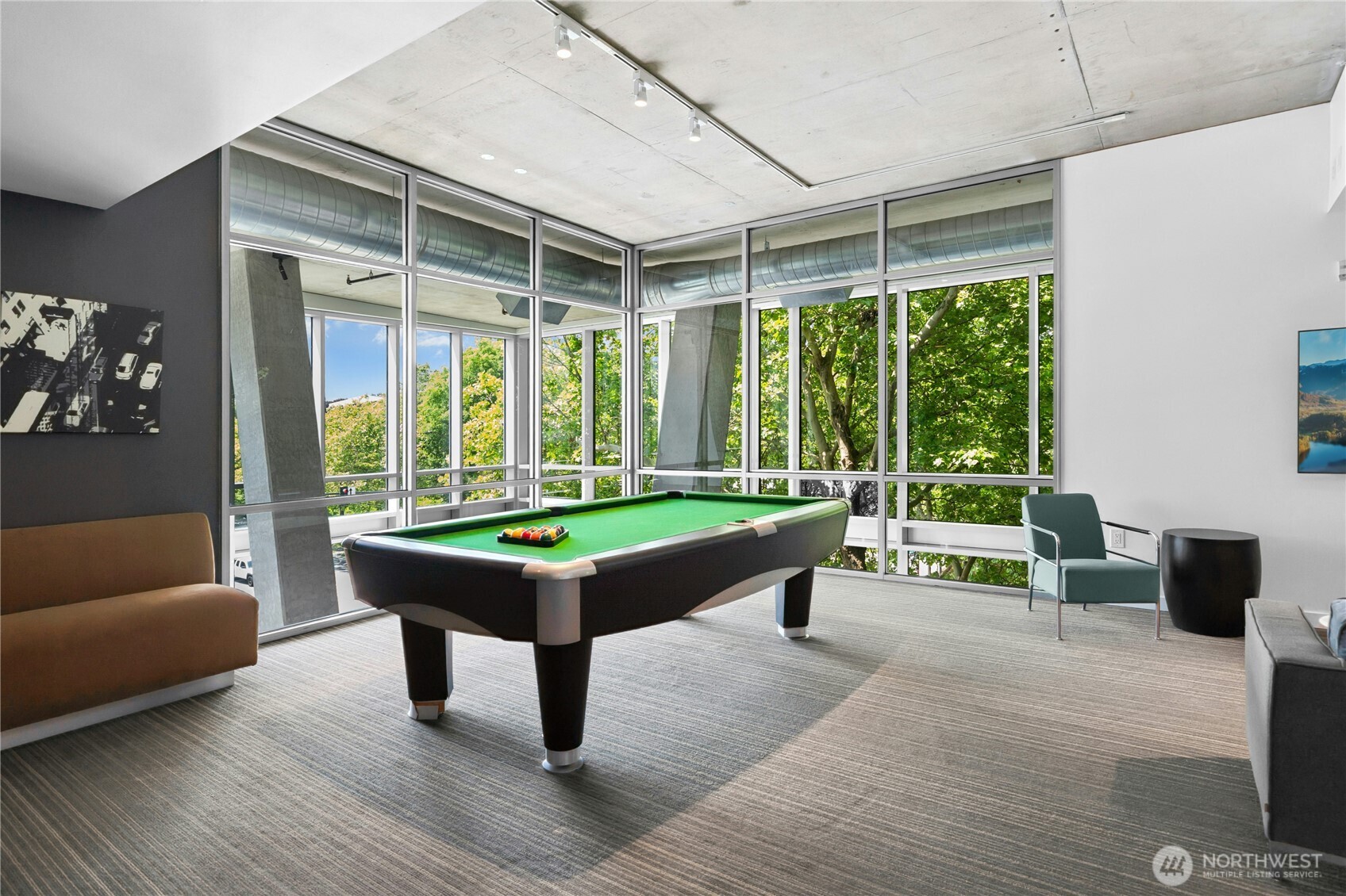 501 Roy Street, Unit F239 Seattle, WA 98109 - Photo 25 of 27 a room with pool table and windows
