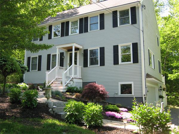 105 Scotland Road Newbury, MA 01951 - Photo 1 of 24 a front view of a house with a yard and outdoor seating