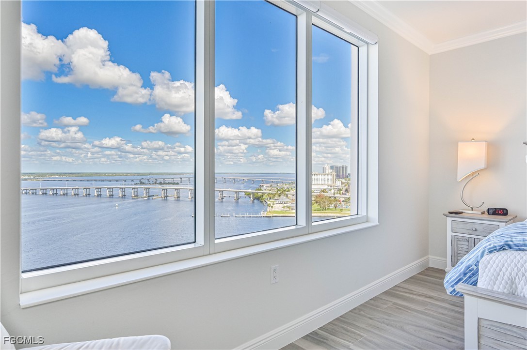 2104 West First Street, Unit 1701 Fort Myers, FL 33901 - Photo 11 of 48 a view of a glass door with a balcony