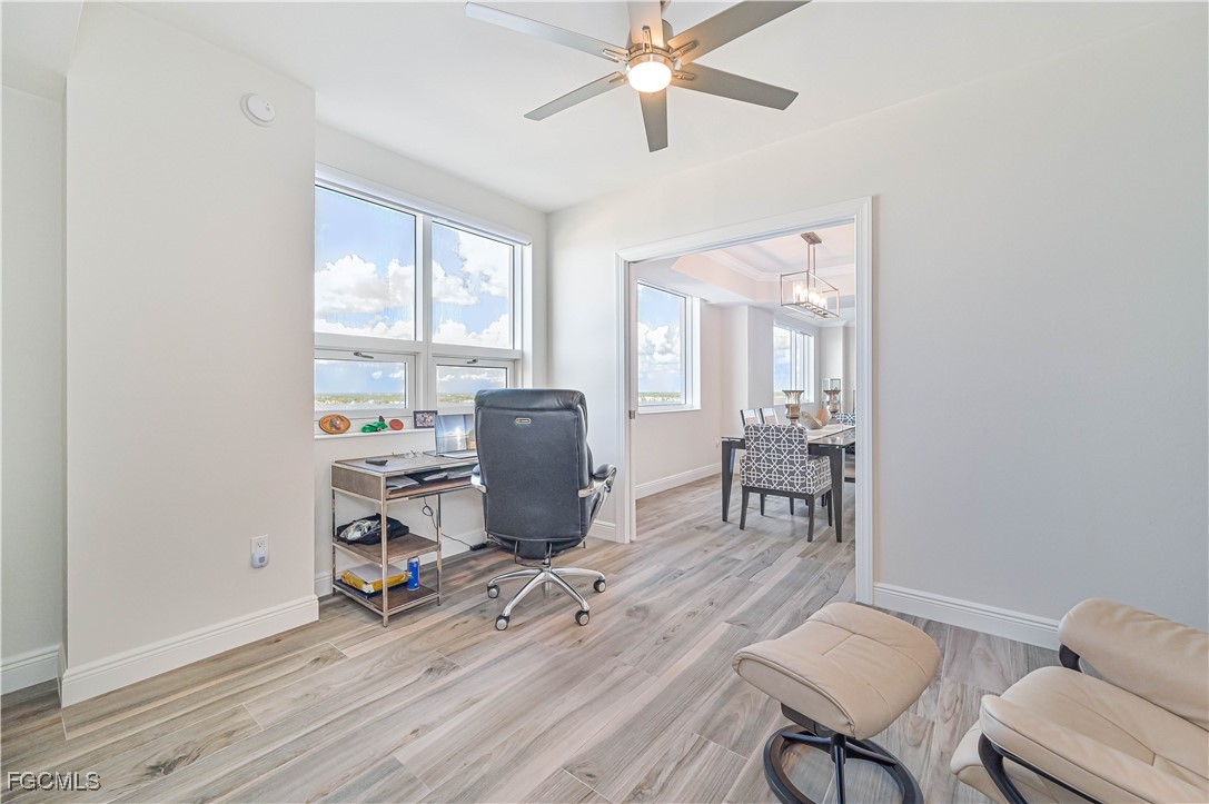 2104 West First Street, Unit 1701 Fort Myers, FL 33901 - Photo 32 of 48 a view of a workspace with furniture and a window
