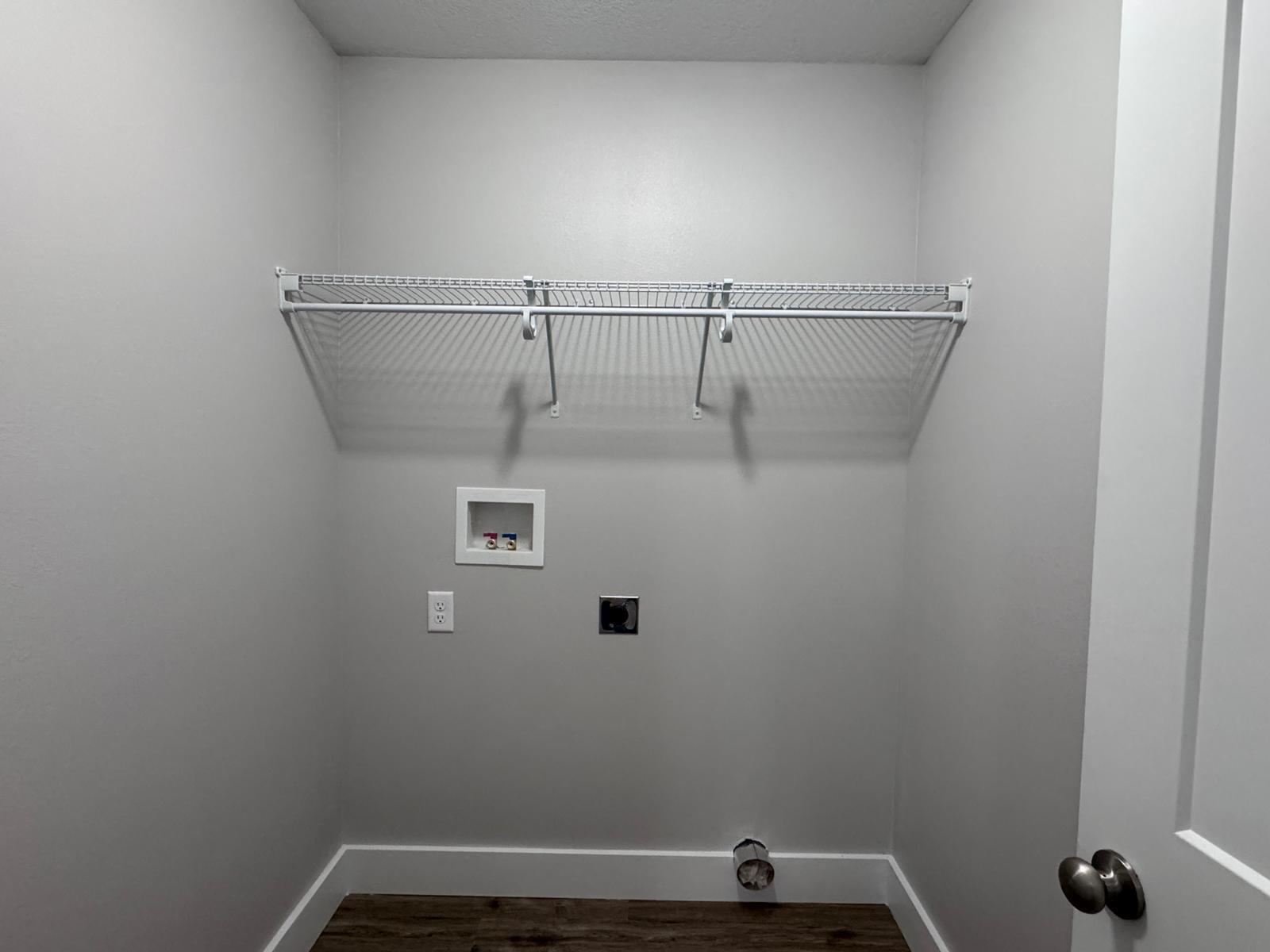 1787 Dads Road Baker, FL 32531 - Photo 17 of 20 a view of small space with racks on the wall