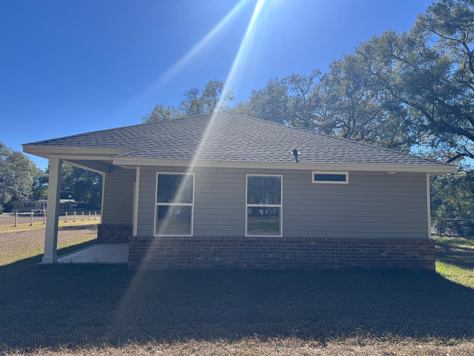 1787 Dads Road Baker, FL 32531 - Photo 19 of 20 a house view with a outdoor space