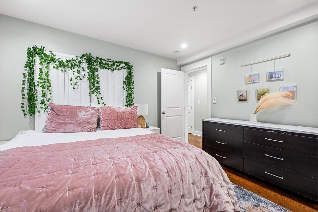 13 Ruthven Street, Unit 1 Boston, MA 02121 - Photo 18 of 35 a bedroom with a bed and a window