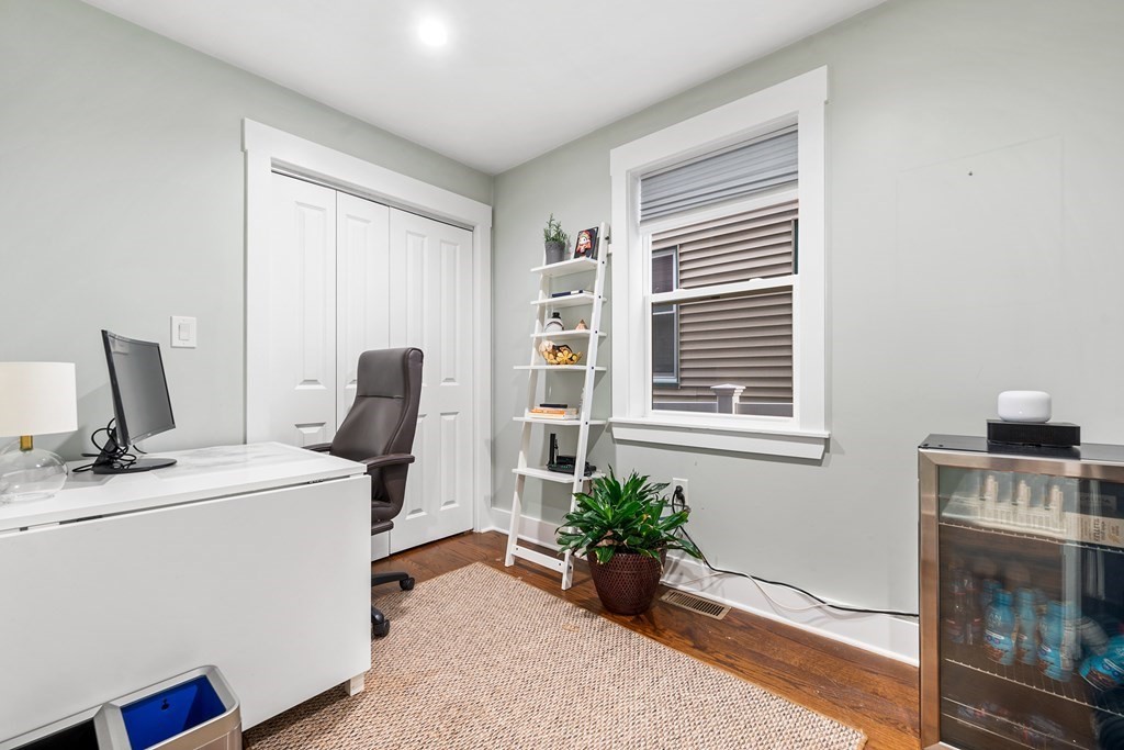 13 Ruthven Street, Unit 1 Boston, MA 02121 - Photo 20 of 35 a view of a workspace with furniture and a window