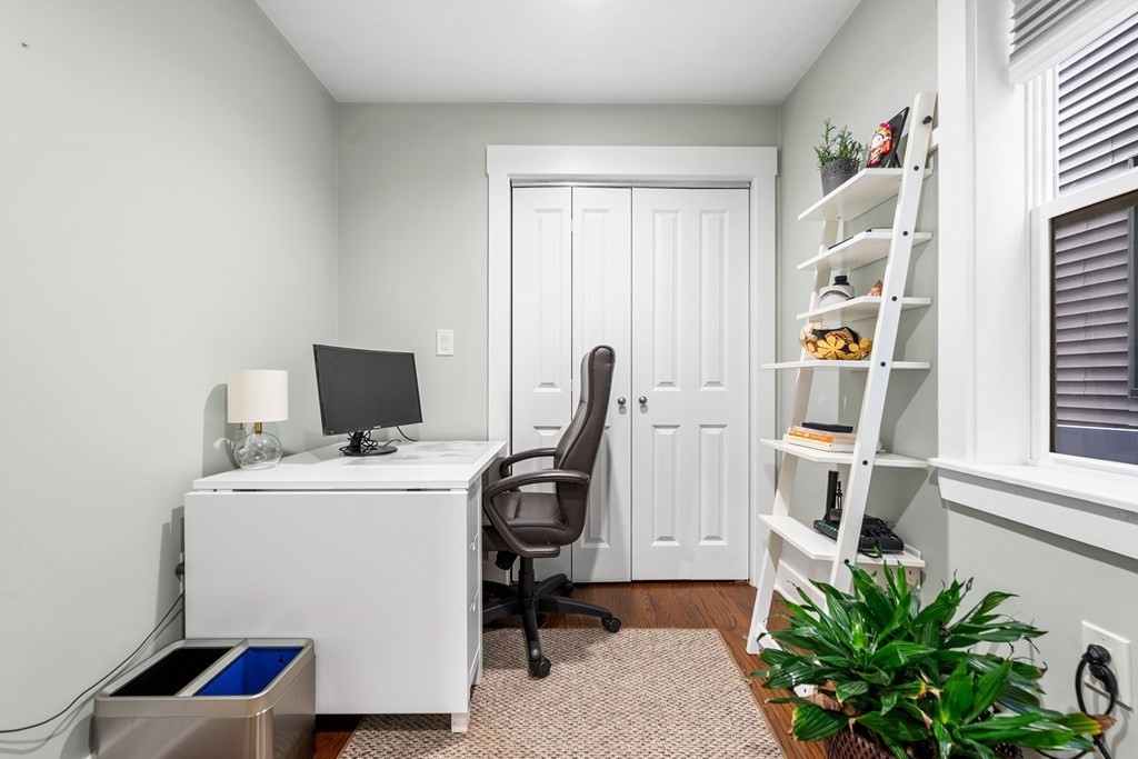 13 Ruthven Street, Unit 1 Boston, MA 02121 - Photo 21 of 35 a view of a workspace with furniture and a window