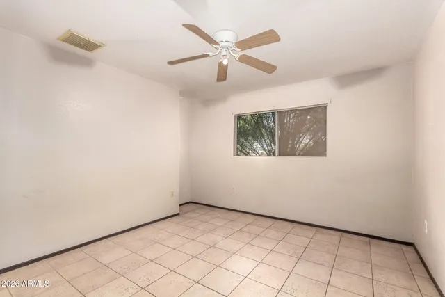 a bathroom with a shower and a shower curtain