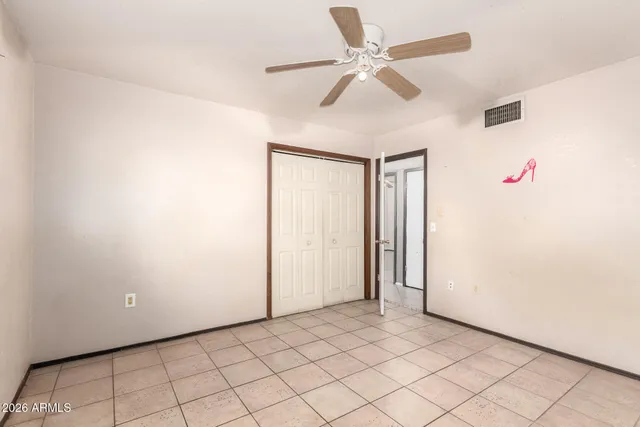 a view of a house with a small yard