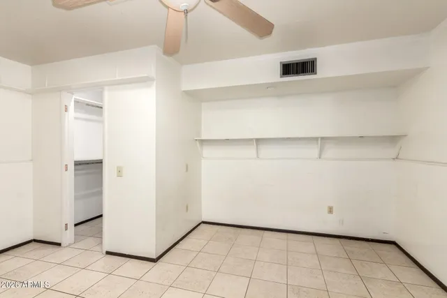 a view of a room with wooden walls