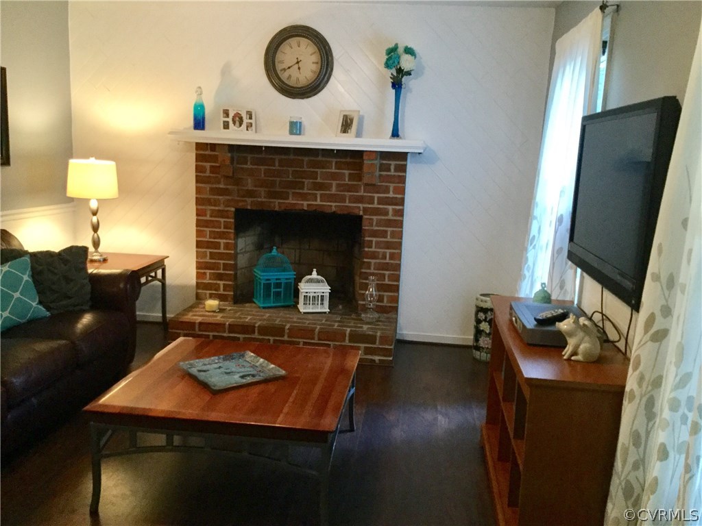 7224 Full Rack Drive Midlothian, VA 23112 - Photo 15 of 35 a living room with furniture and a fireplace