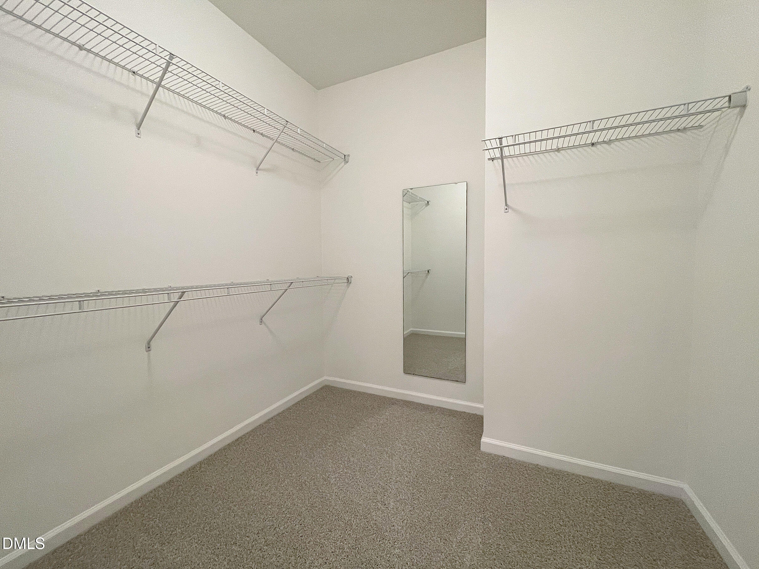 8257 Primanti Boulevard Raleigh, NC 27612 - Photo 17 of 27 a view of a room with racks on the wall