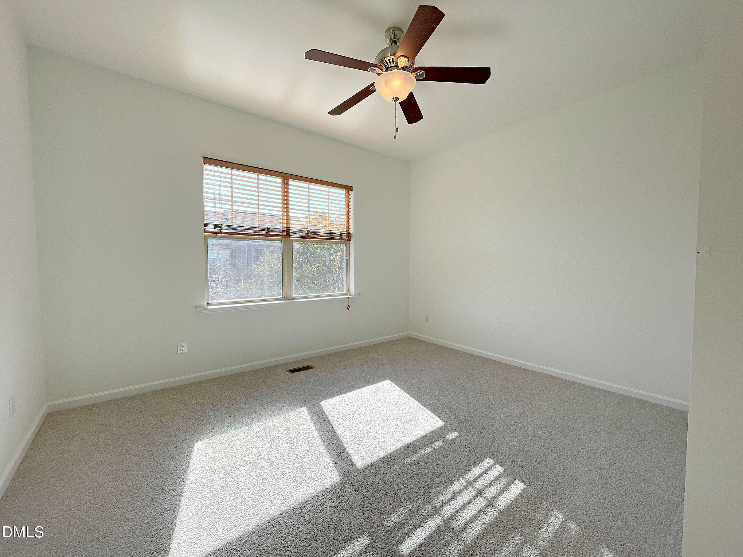 8257 Primanti Boulevard Raleigh, NC 27612 - Photo 18 of 27 an empty room with a window