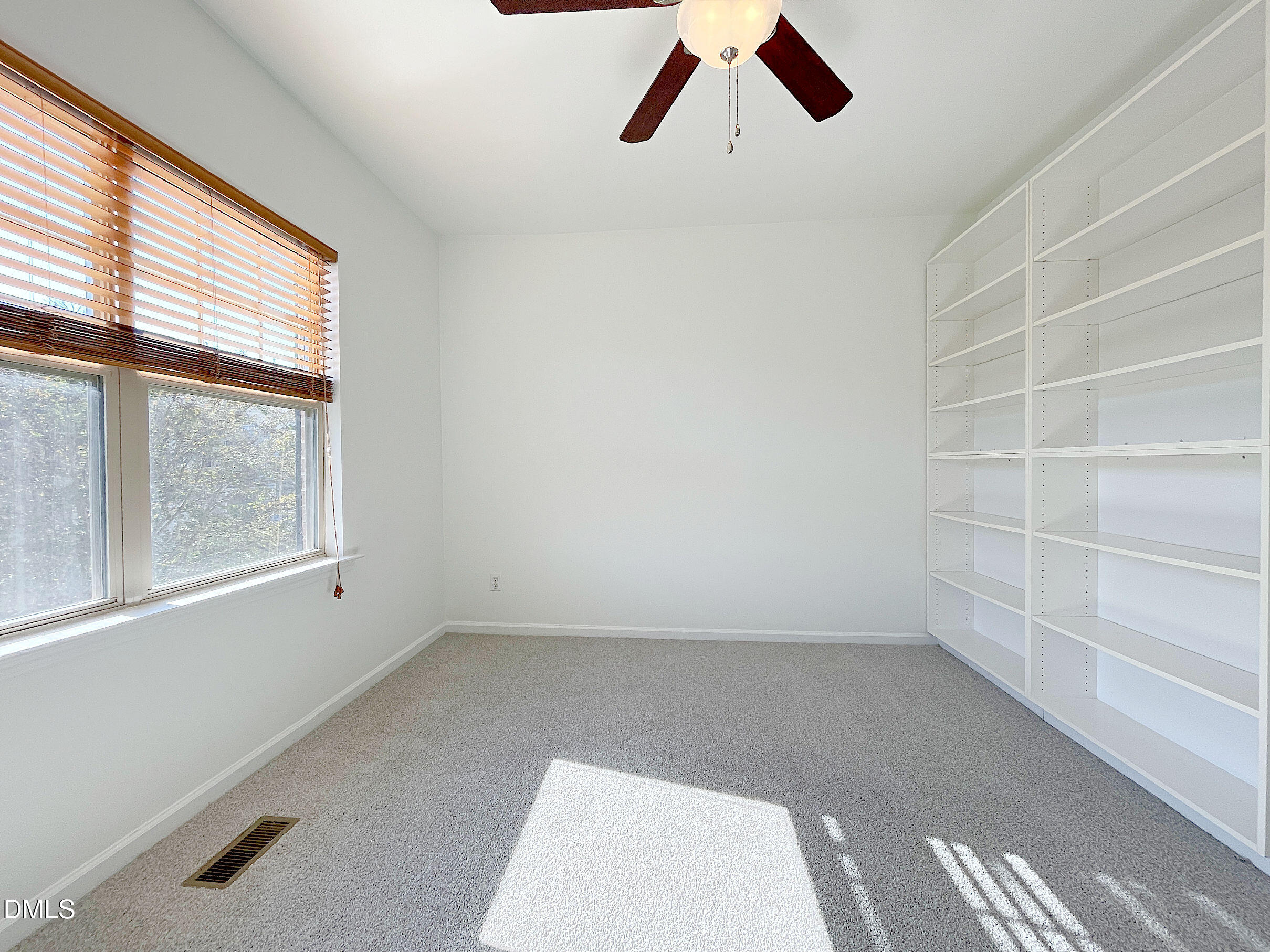 8257 Primanti Boulevard Raleigh, NC 27612 - Photo 19 of 27 an empty room with a window