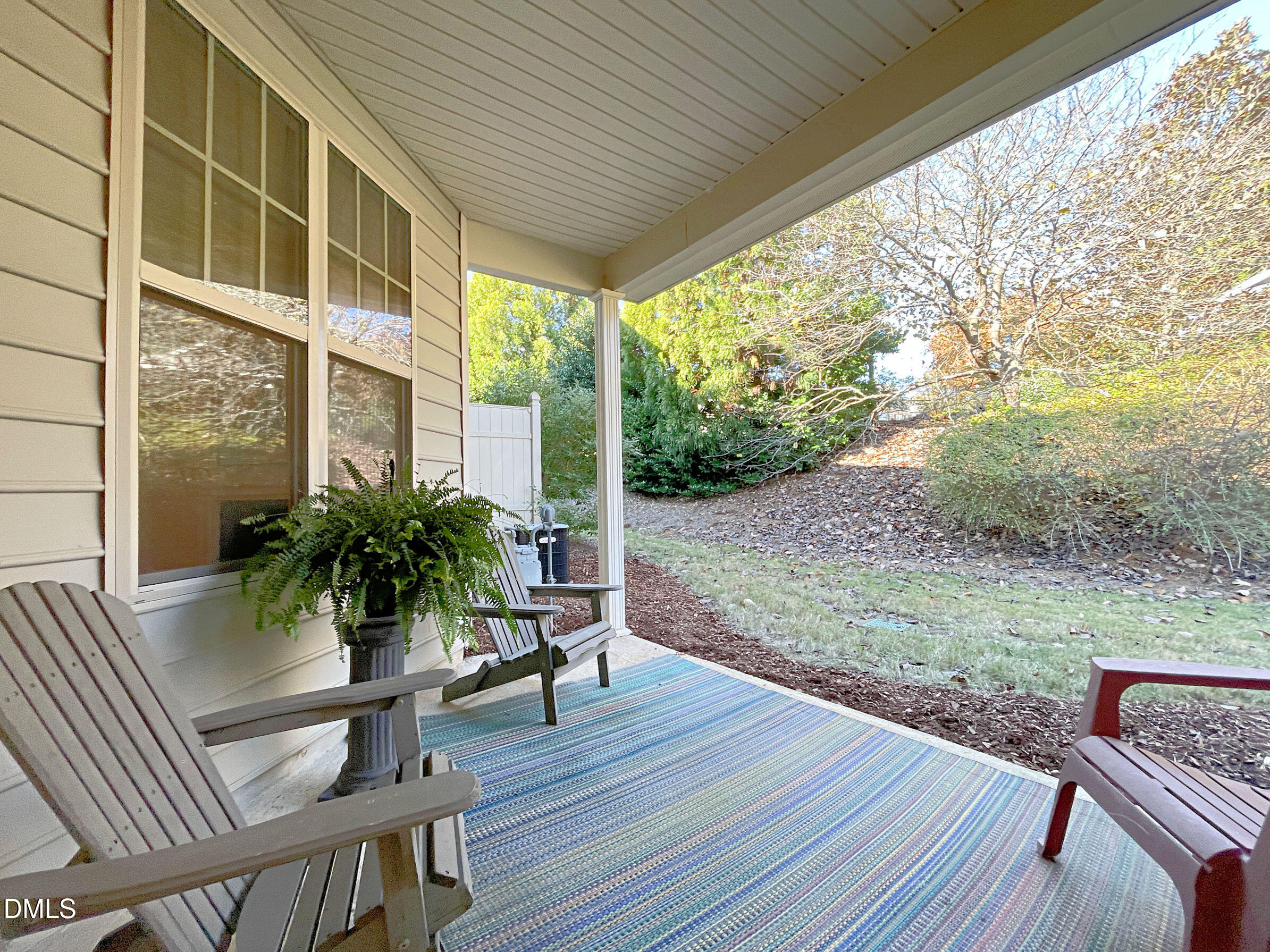 8257 Primanti Boulevard Raleigh, NC 27612 - Photo 22 of 27 a house view with a seating space and garden view