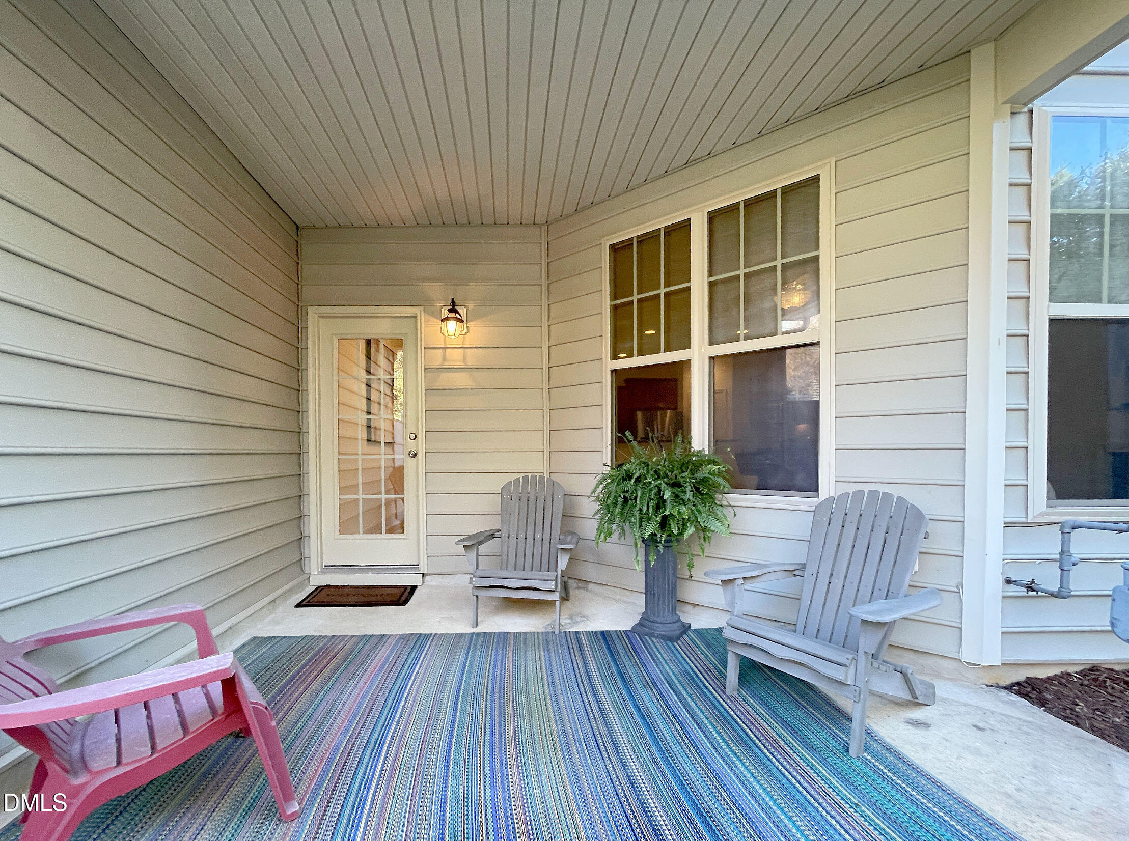 8257 Primanti Boulevard Raleigh, NC 27612 - Photo 23 of 27 a balcony with furniture and wooden floor