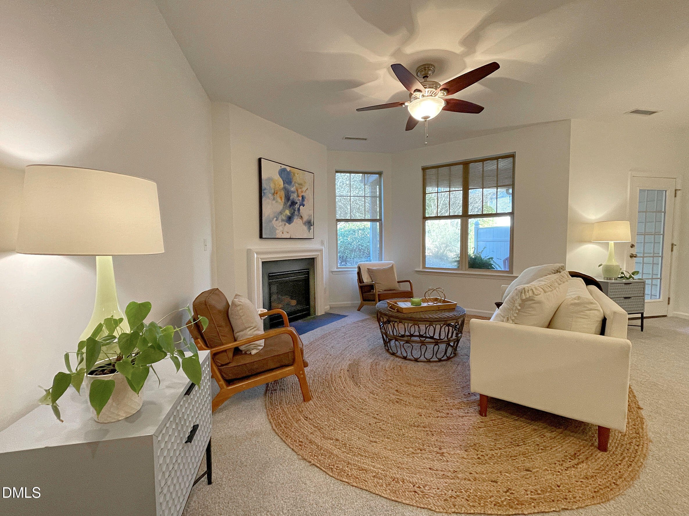 8257 Primanti Boulevard Raleigh, NC 27612 - Photo 3 of 27 a living room with furniture and a fireplace