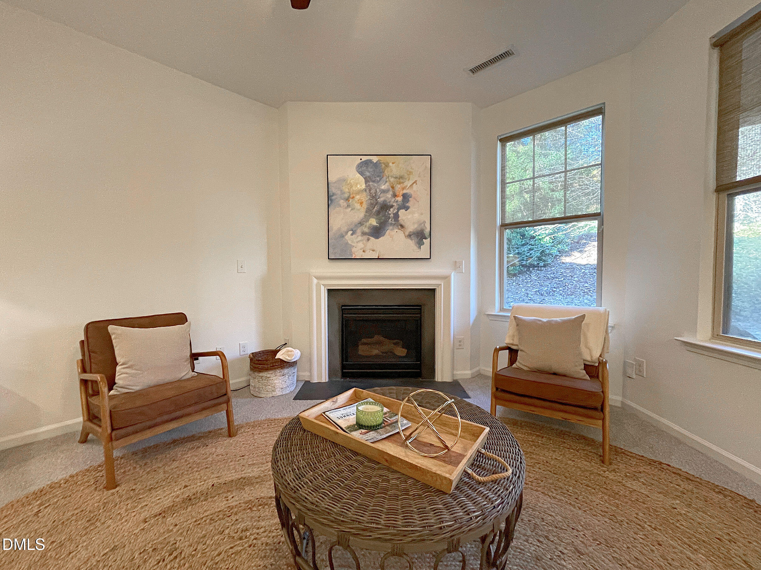 8257 Primanti Boulevard Raleigh, NC 27612 - Photo 4 of 27 a living room with furniture and a fireplace