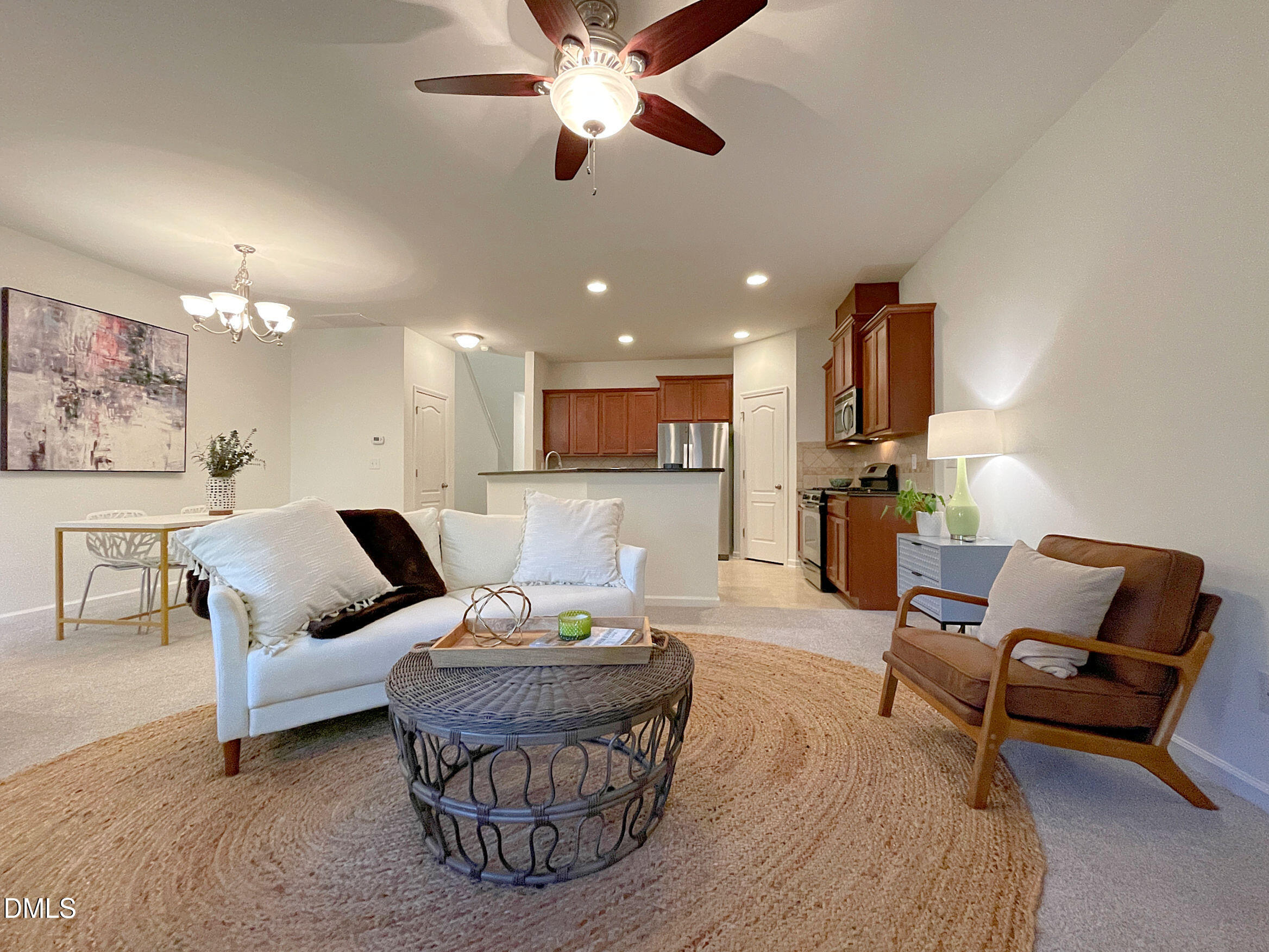 8257 Primanti Boulevard Raleigh, NC 27612 - Photo 5 of 27 a living room with furniture and kitchen view