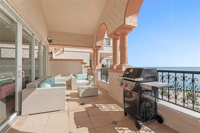 a bedroom with a bed and a flat screen television