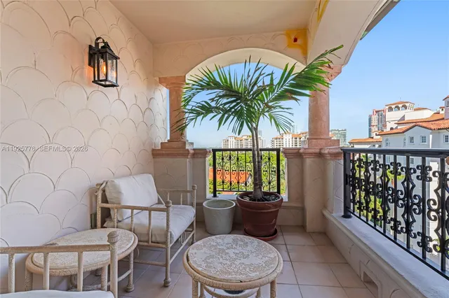 a bathroom with a granite countertop toilet a sink and a bathtub