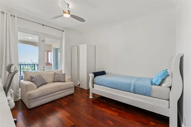 a view of a livingroom with furniture and workspace