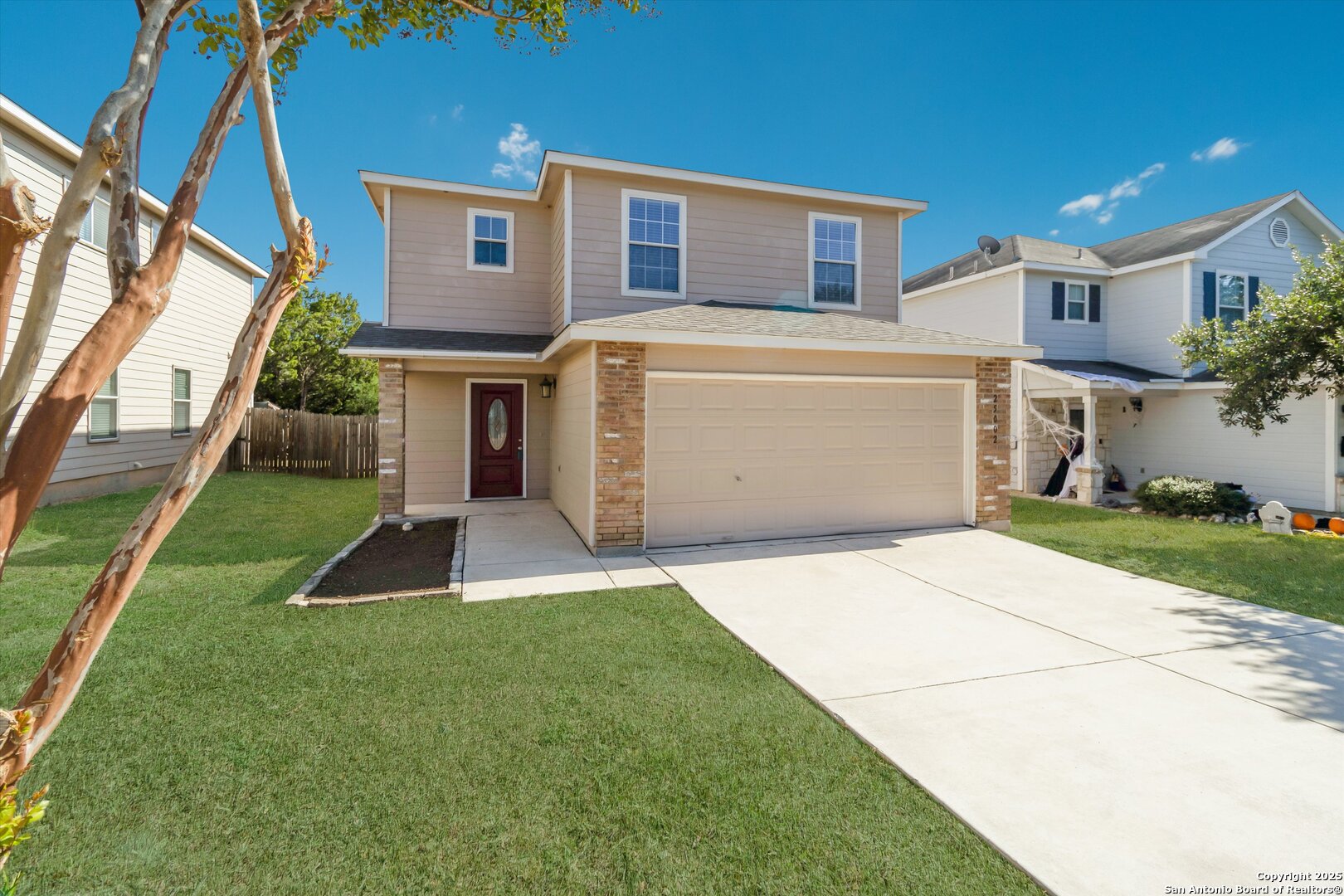 25002 Orchard Acres San Antonio, TX 78261 - Photo 2 of 29 a front view of a house with a yard