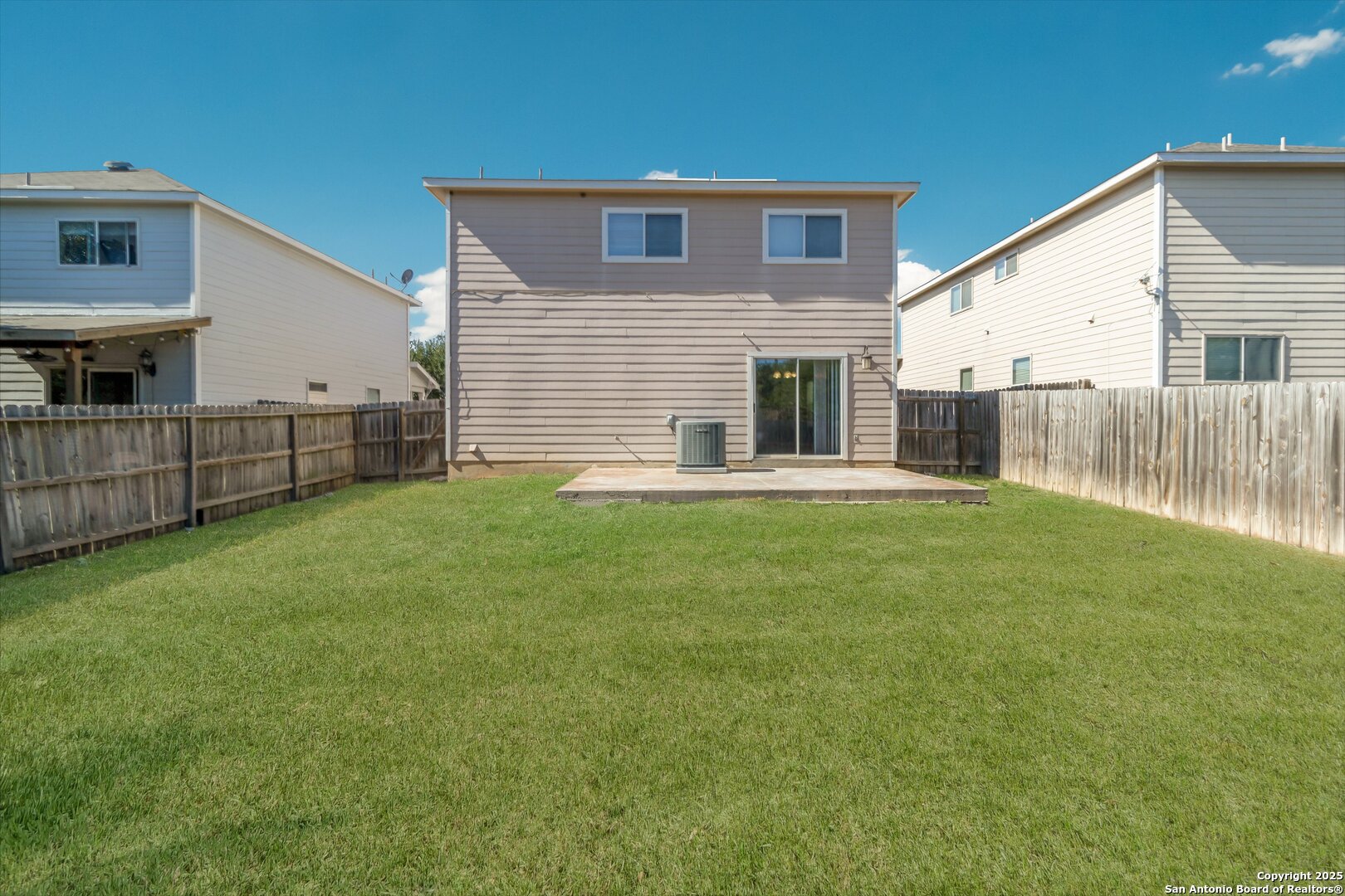 25002 Orchard Acres San Antonio, TX 78261 - Photo 28 of 29 a front view of house with yard and outdoor seating
