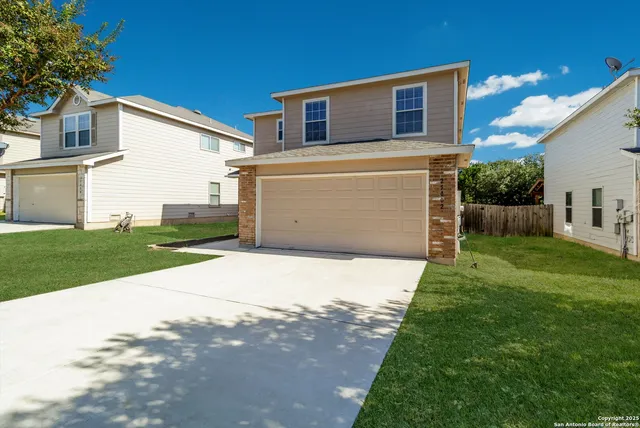 a front view of house with yard