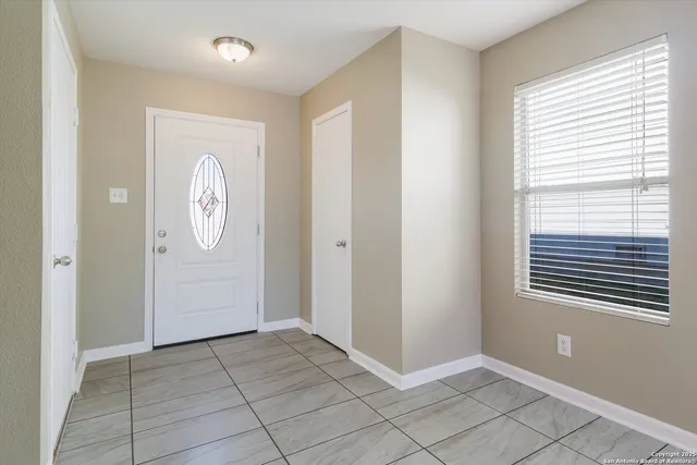 an empty room with windows