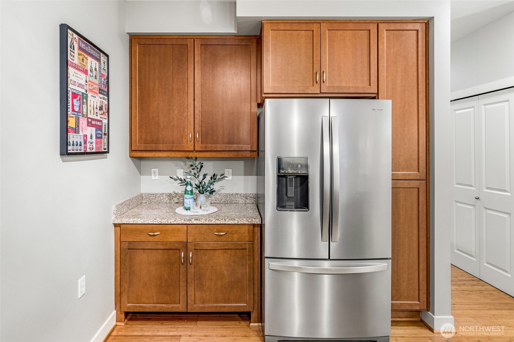 15700 116th Avenue Northeast, Unit 102A Bothell, WA 98011 - Photo 13 of 35 a kitchen with metallic refrigerator freezer and a dishwasher