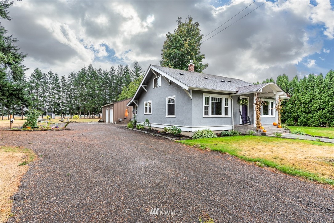 2959 Main Street Custer, WA 98240 - Photo 2 of 33 a view of a house with backyard and trees