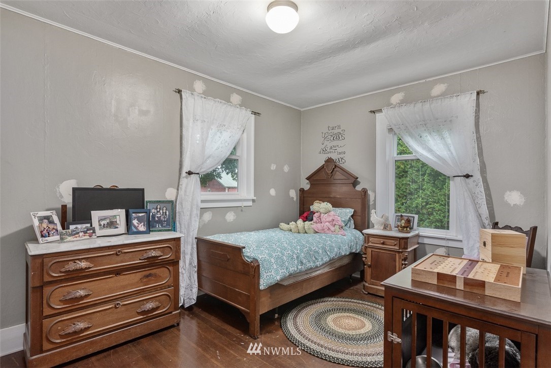 2959 Main Street Custer, WA 98240 - Photo 16 of 33 a bedroom with furniture and a window