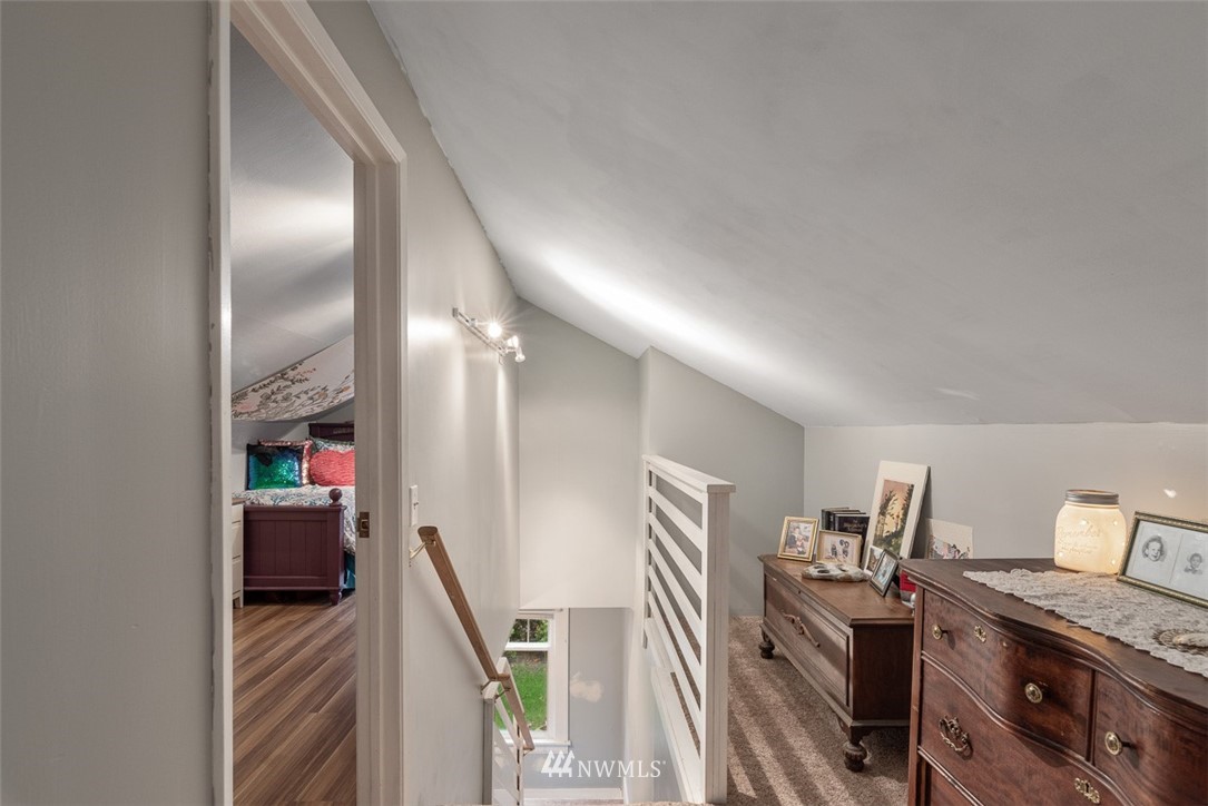 2959 Main Street Custer, WA 98240 - Photo 20 of 33 a view of a hallway with workspace and wooden floor