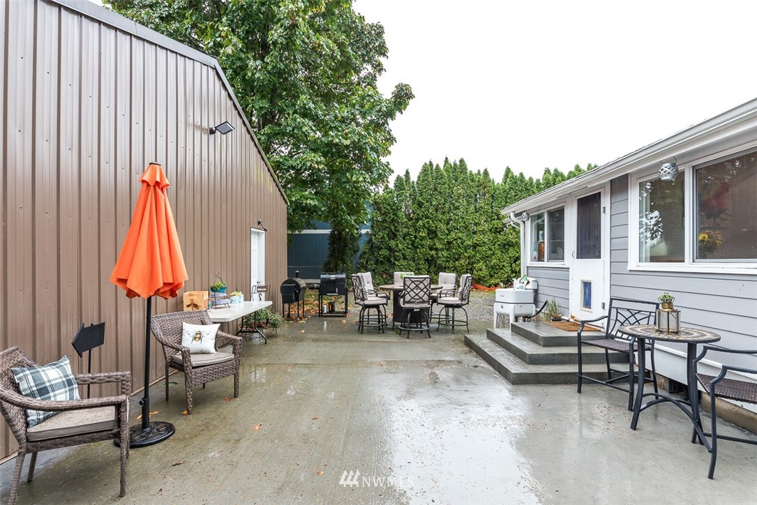 2959 Main Street Custer, WA 98240 - Photo 23 of 33 a view of patio with a table and chairs and couches