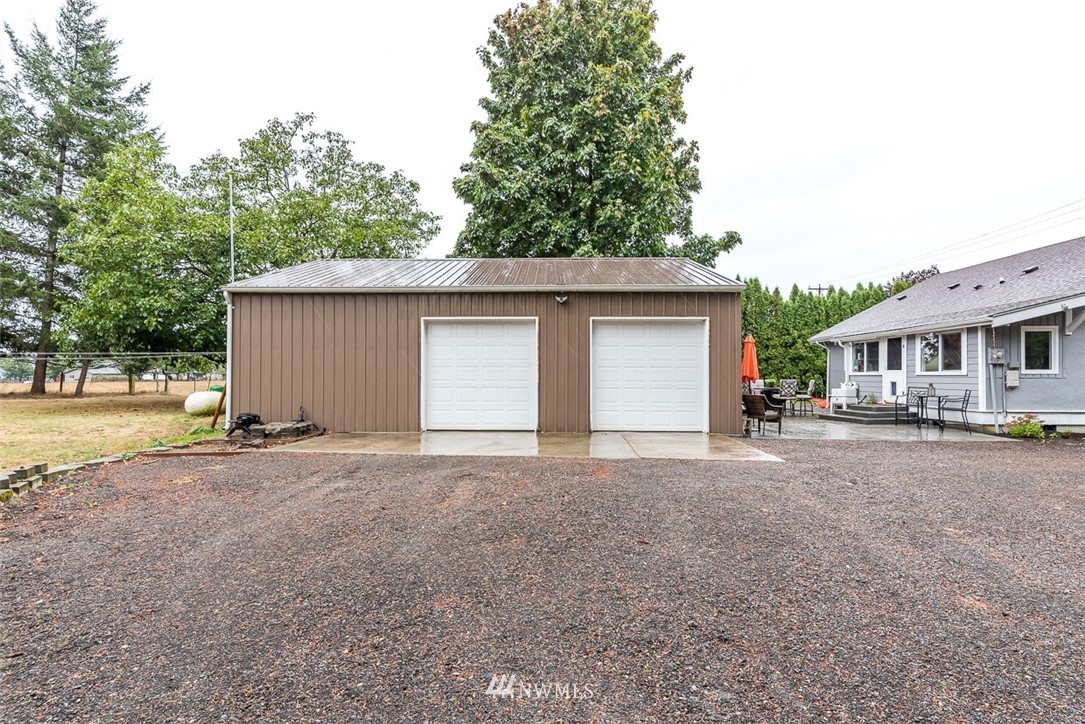2959 Main Street Custer, WA 98240 - Photo 25 of 33 a view of a house with backyard and trees