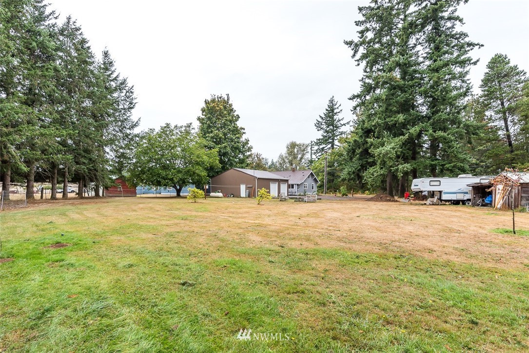 2959 Main Street Custer, WA 98240 - Photo 31 of 33 a view of a house with a yard and sitting area