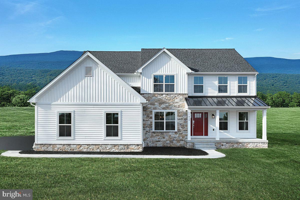 910 Freemansville Road Reading, PA 19607 - Photo 1 of 38 a front view of a house with a yard
