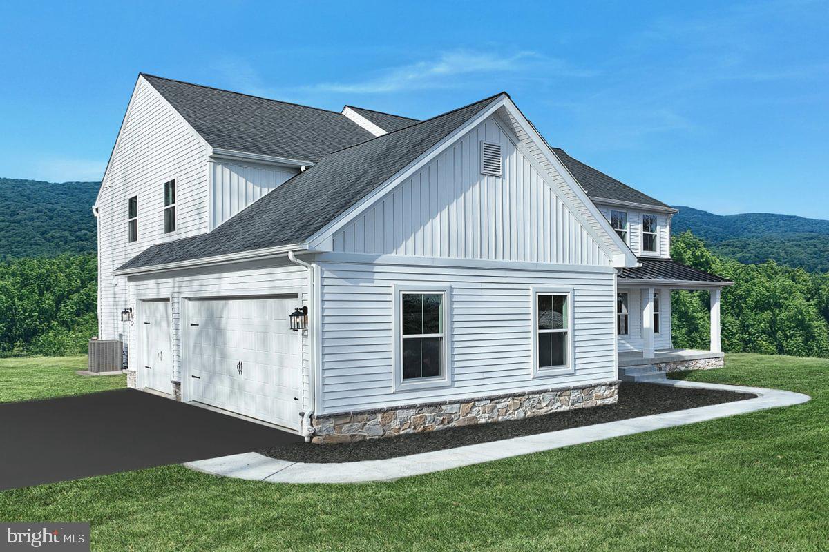 910 Freemansville Road Reading, PA 19607 - Photo 3 of 38 a view of a house with a yard