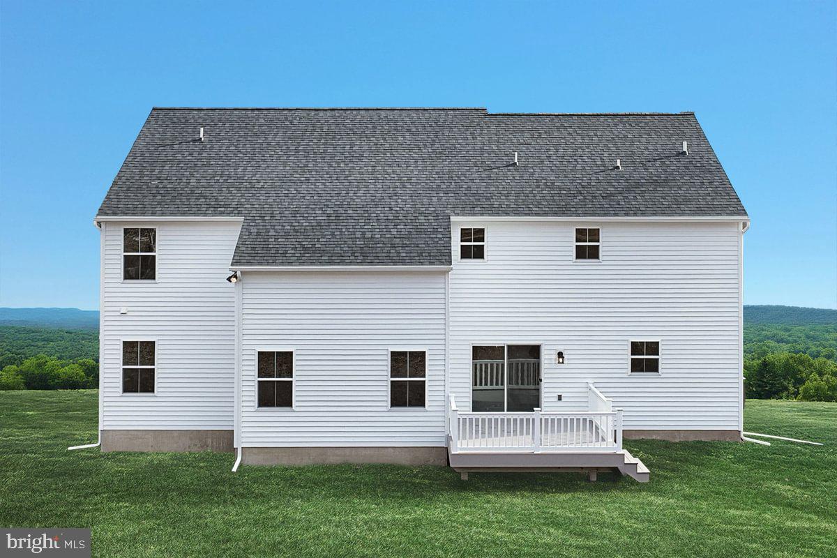910 Freemansville Road Reading, PA 19607 - Photo 4 of 38 a view of a house with a backyard