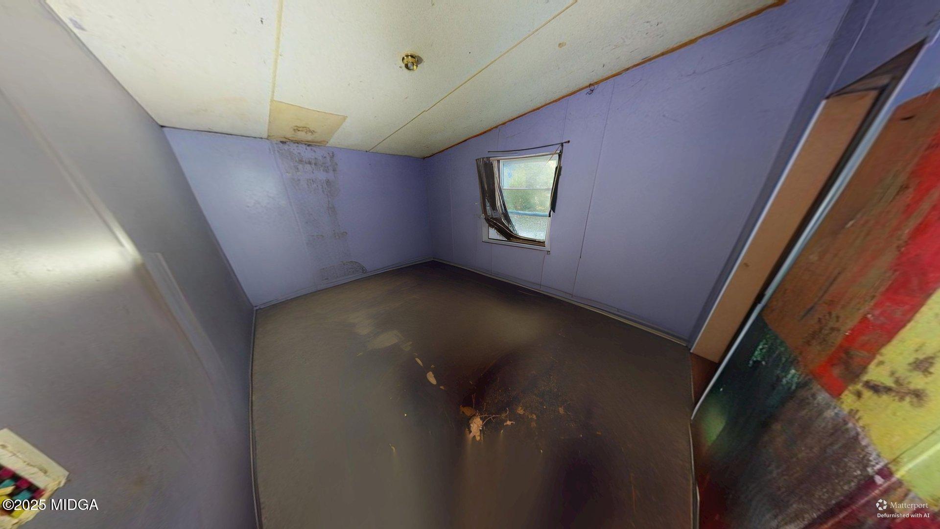 401 Towaliga Trail Forsyth, GA 31029 - Photo 17 of 30 a view of a hallway with a window