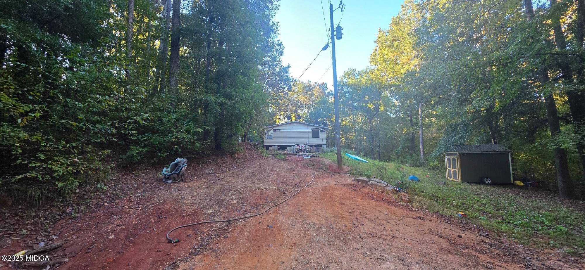 401 Towaliga Trail Forsyth, GA 31029 - Photo 19 of 30 a view of a outdoor space and a yard