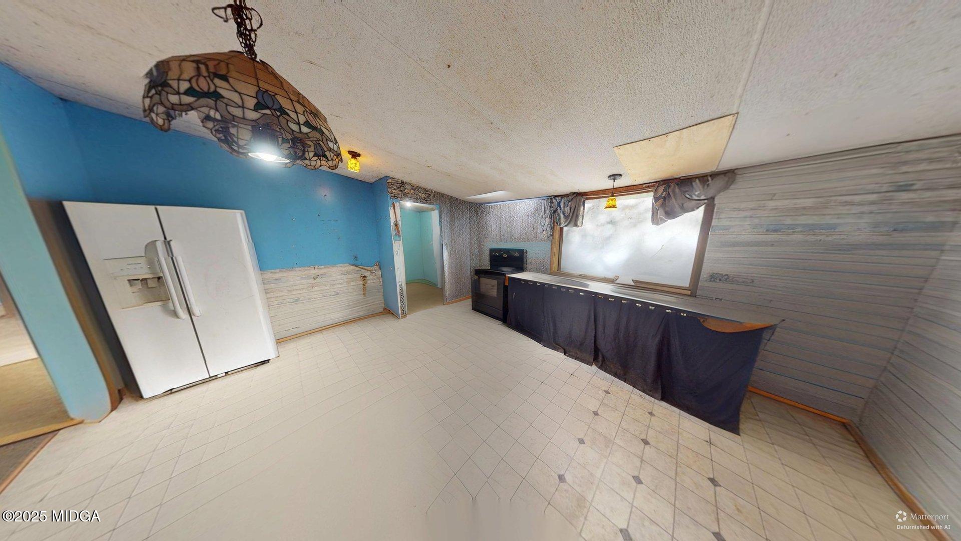 401 Towaliga Trail Forsyth, GA 31029 - Photo 4 of 30 a very nice looking room with a large window