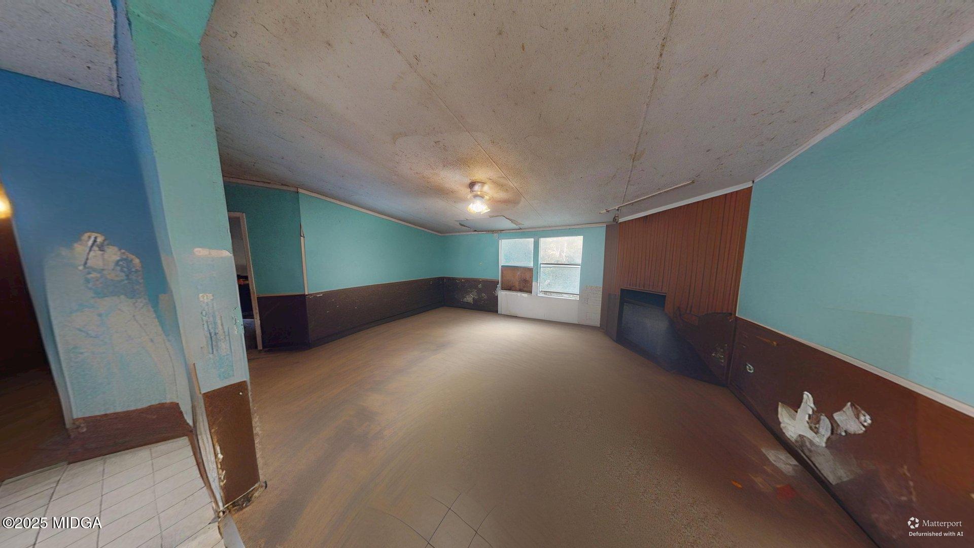 401 Towaliga Trail Forsyth, GA 31029 - Photo 8 of 30 a view of empty room with wooden floor