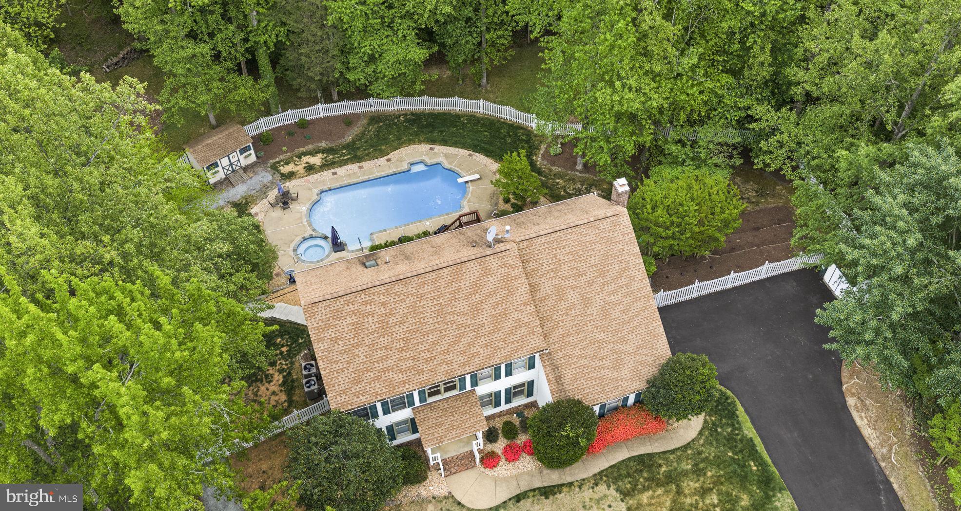 100 Boscobel Road Fredericksburg, VA 22405 - Photo 57 of 67 an aerial view of a house with a yard and large trees