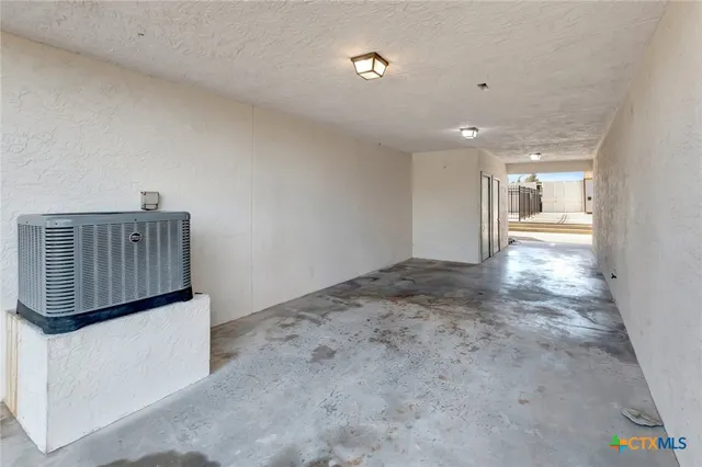 a view of a roof deck with couches