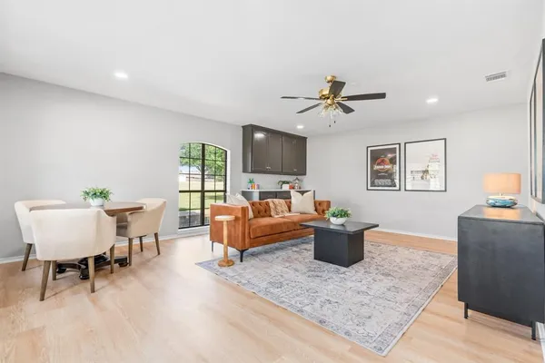 a living room with furniture and a couch