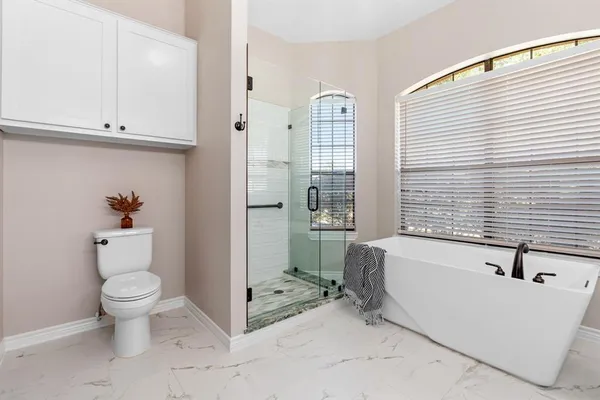 a room with furniture and a window