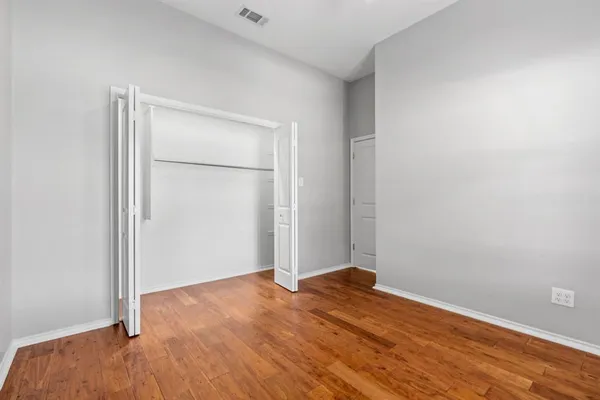 a backyard of a house with a garden and deck