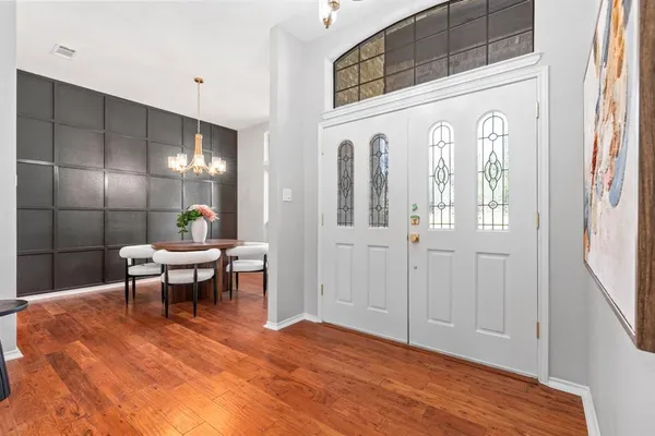 a view of a livingroom with furniture and window