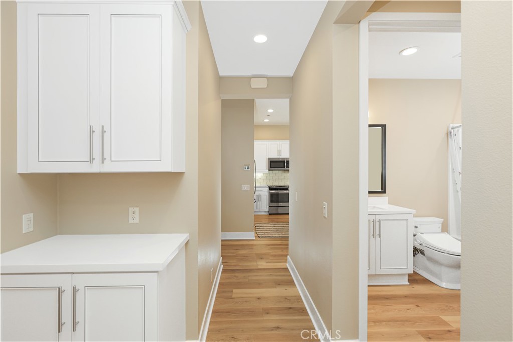 245 Follyhatch Irvine, CA 92618 - Photo 14 of 44 a bathroom with a sink a toilet and shower